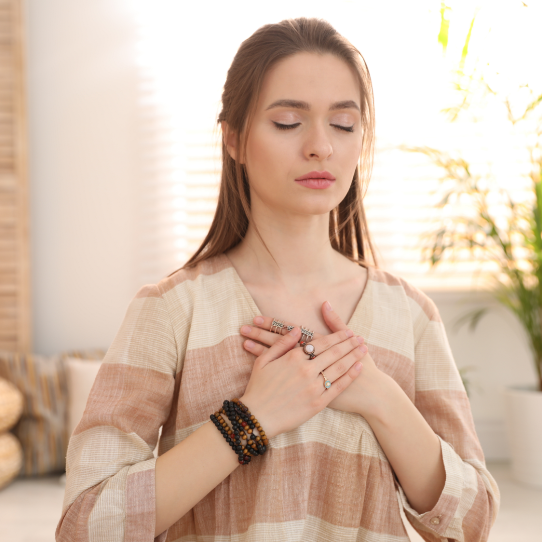 A young woman practicing deep breathing to heal her lungs.