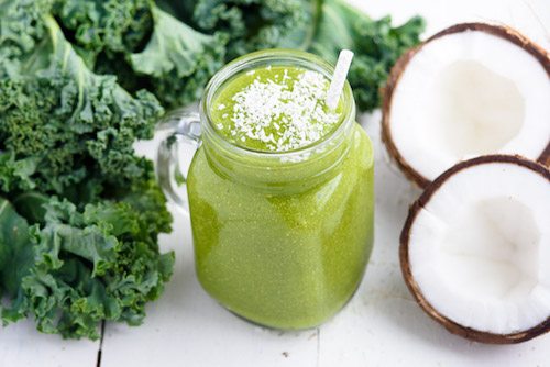 Picture of Kimberly holding Lil Bub.