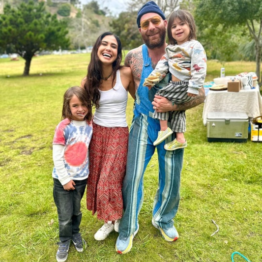 Kimberly Snyder and her family outside at the park.
