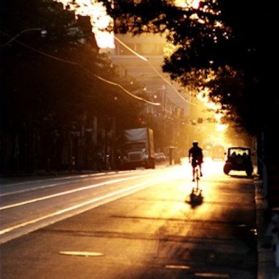 Picture of person biking in the evening time