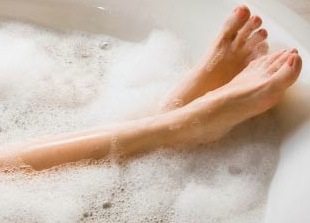 Picture of legs poking up from a bubble bath