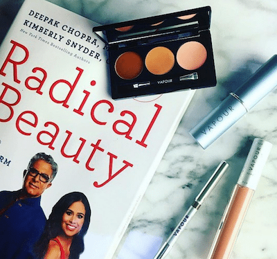Picture of Radical Beauty book and Vapour makeup.