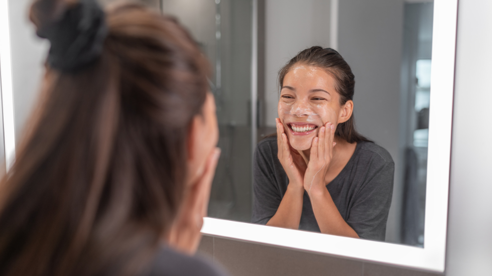 A-woman-exfoliates-her-face