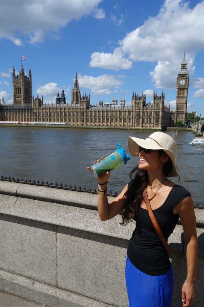 Kimberly drinking her Glowing Green Smoothie on the go in London