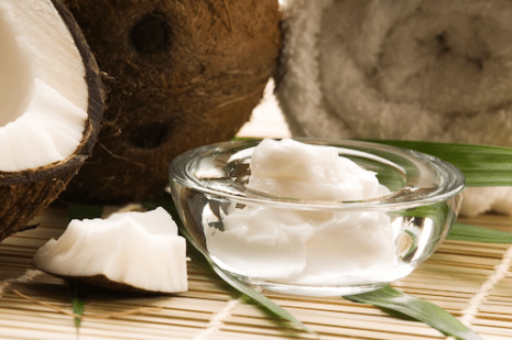 Picture of raw coconuts and coconut oil