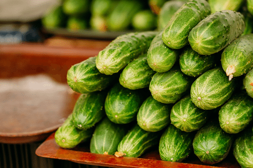 Picture of fresh cucumbers stacked