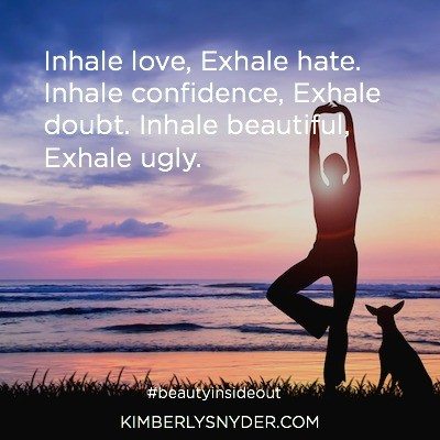 Picture of woman doing yoga on the beach with her dog and the quote, Inhale love, Exhale hate. Inhale confidence, Exhale doubt. Inhale beautiful, Exhale ugly.