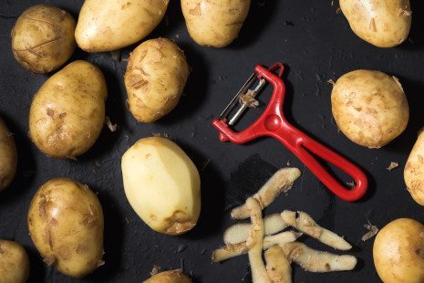 Image of potatoes and peeler