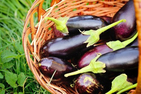 Image of eggplants in woven basket