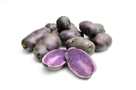 Picture of Purple Potatoes On White Background.