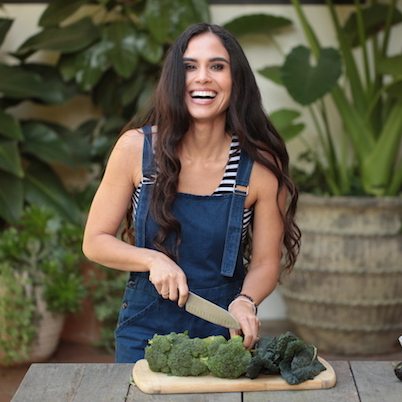 Picture of Kimberly cutting veggies.