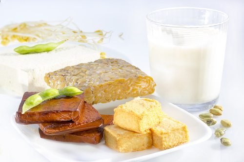 Variety of soy products including tofu tempeh milk and sprouts.