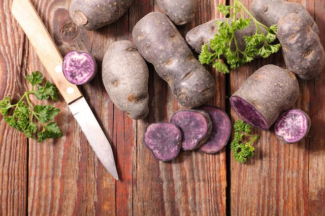 Picture of raw purple potato.