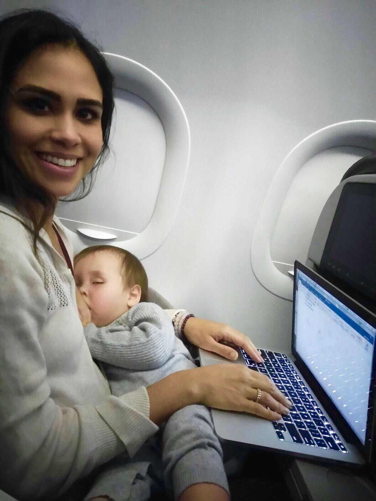 Picture of Kimberly and Lil Bub traveling on a plane. 