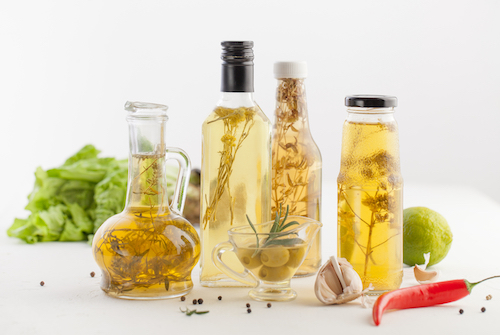 Oil infusion with herbs for cooking and cosmetics. Copy space text