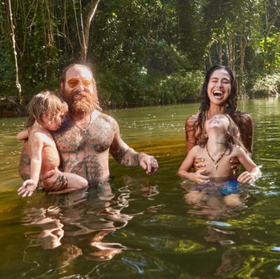 Kimberly and her family swimming in Hawaii 
