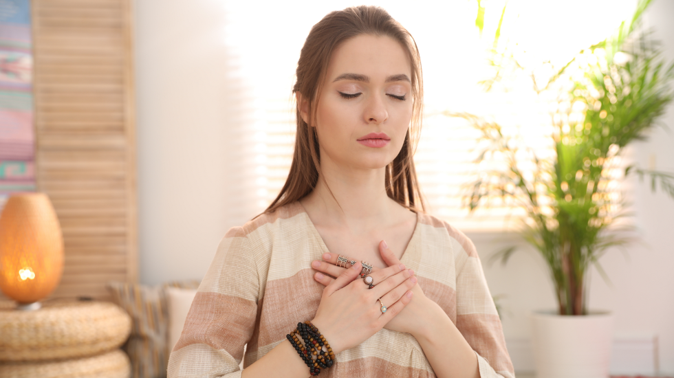A young woman practicing deep breathing to heal her lungs.