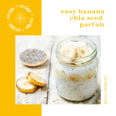 An easy banana chia seed parfait, served in a mason jar next to chia seeds and banana slices.
